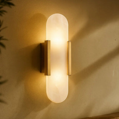 Toru alabaster wall lamp front view with diffused lighting