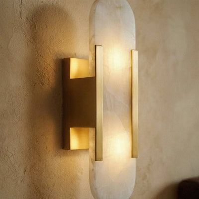 Alabaster wall lamp installed in hallway interior setting