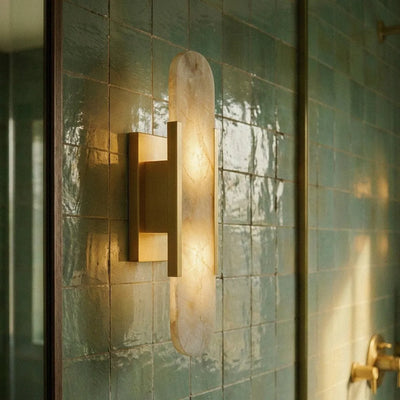 Alabaster wall lamp in bedroom setting with mounted fixture